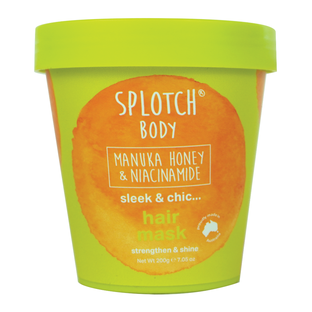 Splotch Body hair mask container with green lid and orange label on a white background