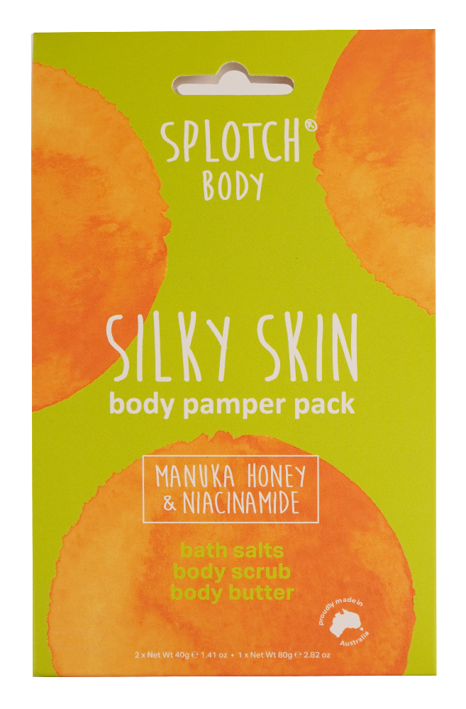 Splotch Body Silky Skin body pamper pack packaging with manuka honey and niacinamide on a green background.