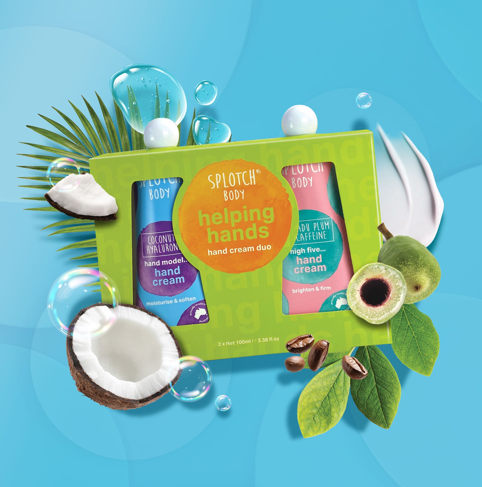 Splotch Body helping hands hand cream duo packaging on a blue background with coconut and leaves.