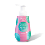 
A white pump bottle of SPLOTCH BODY Kakadu Plum & Caffeine Shower Foam with a pink and teal watercolor label. The text on the bottle identifies it as "glow slayer... shower foam" designed to "brighten & firm". The net content is listed as 500 ml / 16.91 fl oz.
