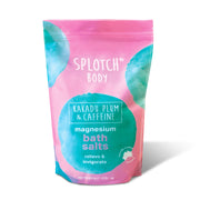 A pink pouch of SPLOTCH BODY magnesium bath salts with a teal and white label. The text reads: "SPLOTCH BODY," "KAKADU PLUM & CAFFEINE," "magnesium bath salts," and "relieve & invigorate". The net weight is 950g 33.51oz.