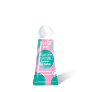 A pink and teal lip balm tube from "Splotch Body" with "Kakadu Plum & Caffeine" labeled as "flawless... lip balm." The text beneath says "plump & smooth," and a small seal reads "proudly made in Australia." 