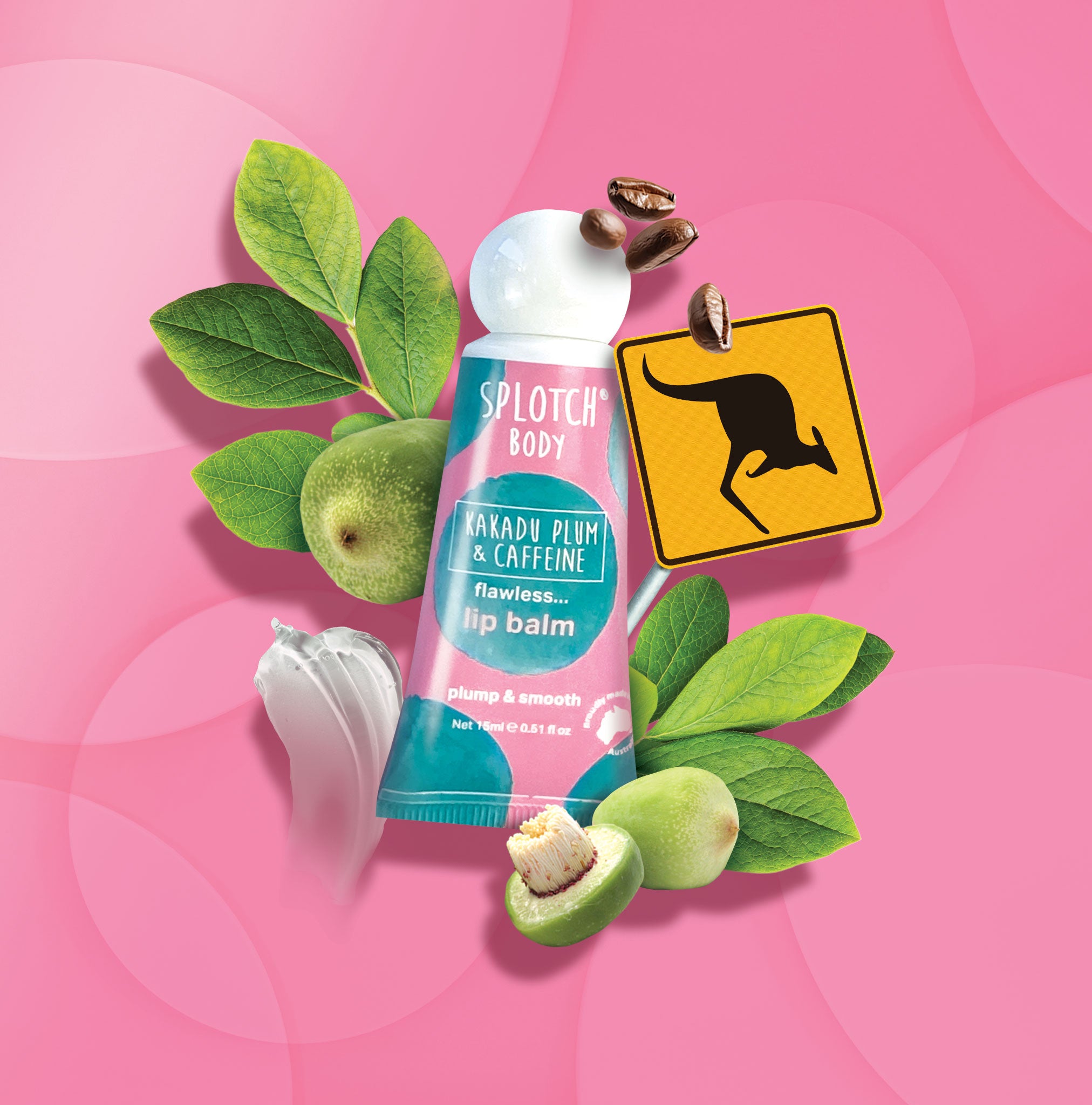 This graphic showcases a pink squeeze tube with teal watercolor splotches and the same signature white spherical cap. It is positioned centrally among various Australian-themed elements: green Kakadu plums (some whole and one sliced open to show the seed), several dark roasted coffee beans, and green leaves. A yellow diamond-shaped Australian road sign with a black kangaroo silhouette is visible behind the tube. The bottom of the tube features a small white map of Australia and the text "plump & smooth".