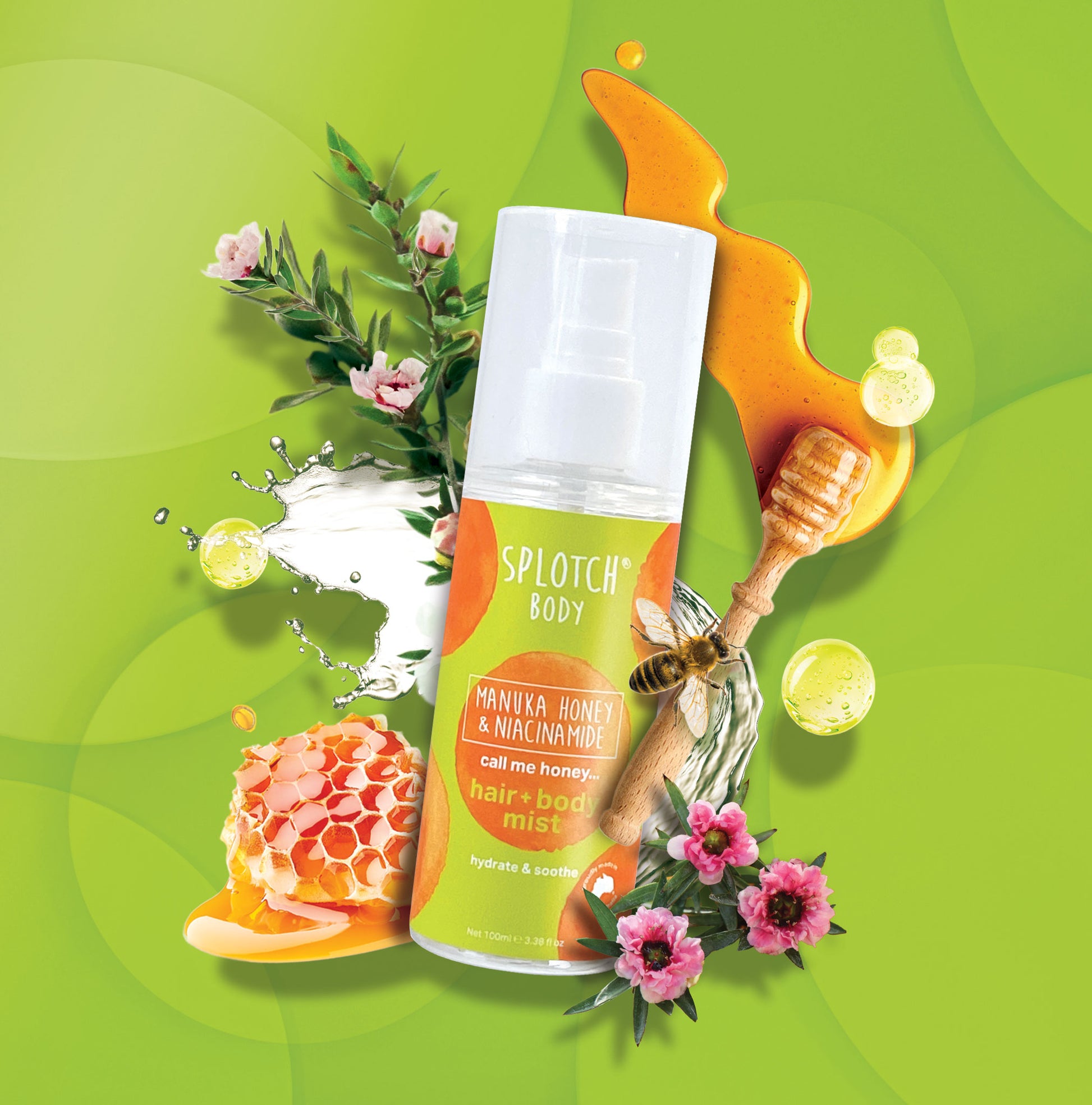 A promotional image for Splotch Body "call me honey..." hair + body mist set against a green abstract background. The spray bottle is positioned centrally, surrounded by illustrative elements including a honeycomb dripping with honey, a wooden honey dipper, a honeybee, and small pink Manuka flowers. The label notes the mist contains Manuka Honey & Niacinamide and is designed to "hydrate & soothe".