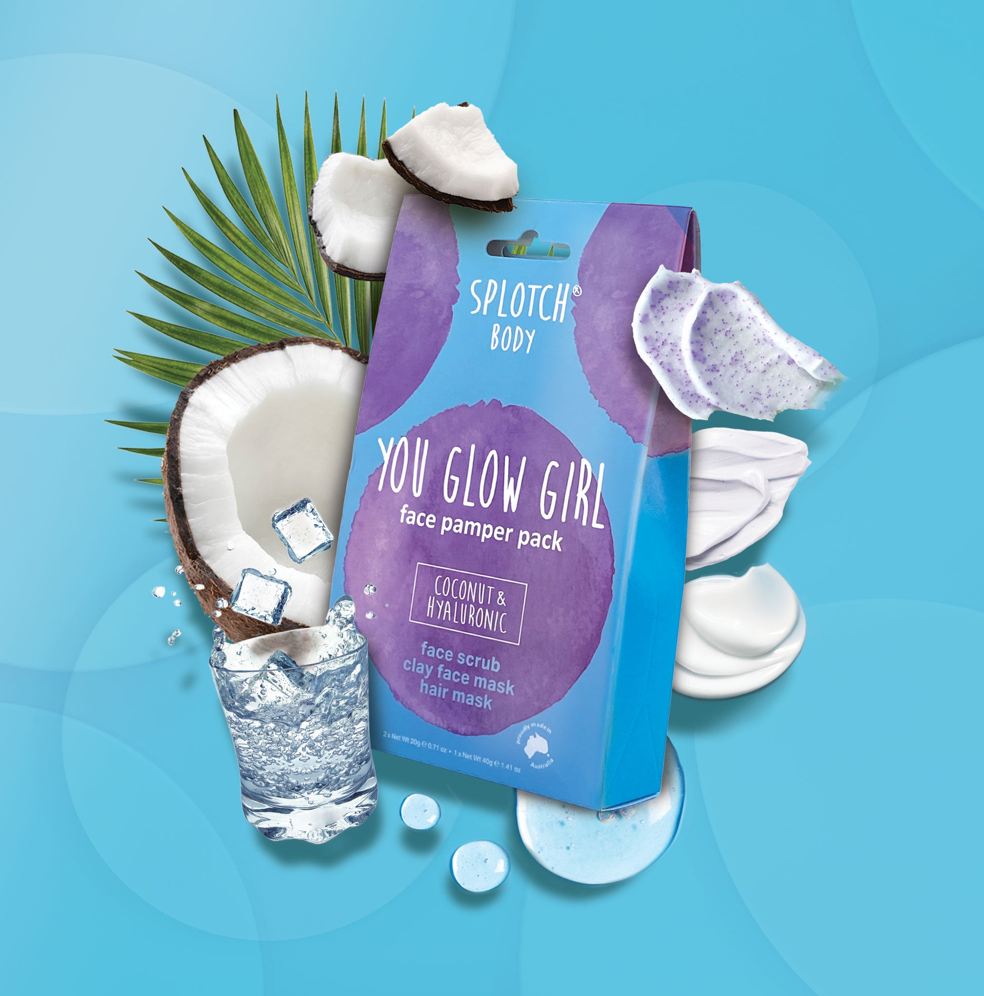 A collection of Splotch Body Coconut & Hyaluronic products, featuring three items: Silky Suds Shower Foam (500ml pump bottle), Frizz Fighter Hair Mask (200g tub), and the Smooth Vibes Body Pamper Pack (containing bath salts, body scrub, and body butter). The packaging is a vibrant light blue with large purple watercolor splotches, and all products are proudly made in Australia, designed to hydrate and soften skin and hair.